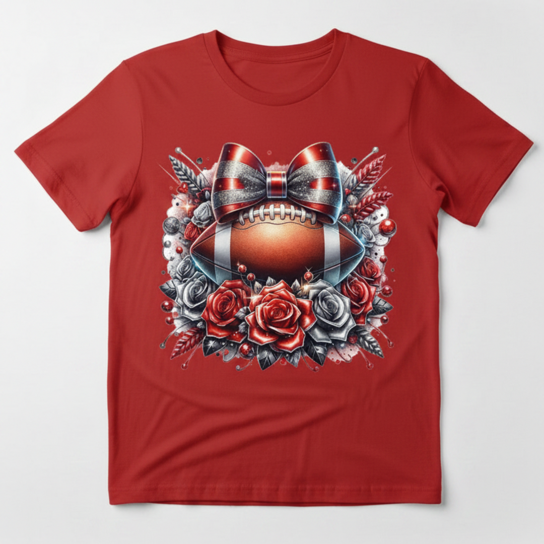 Football Roses Glitter Bow graphic tee with football, red and silver glitter bow, and roses on silver background