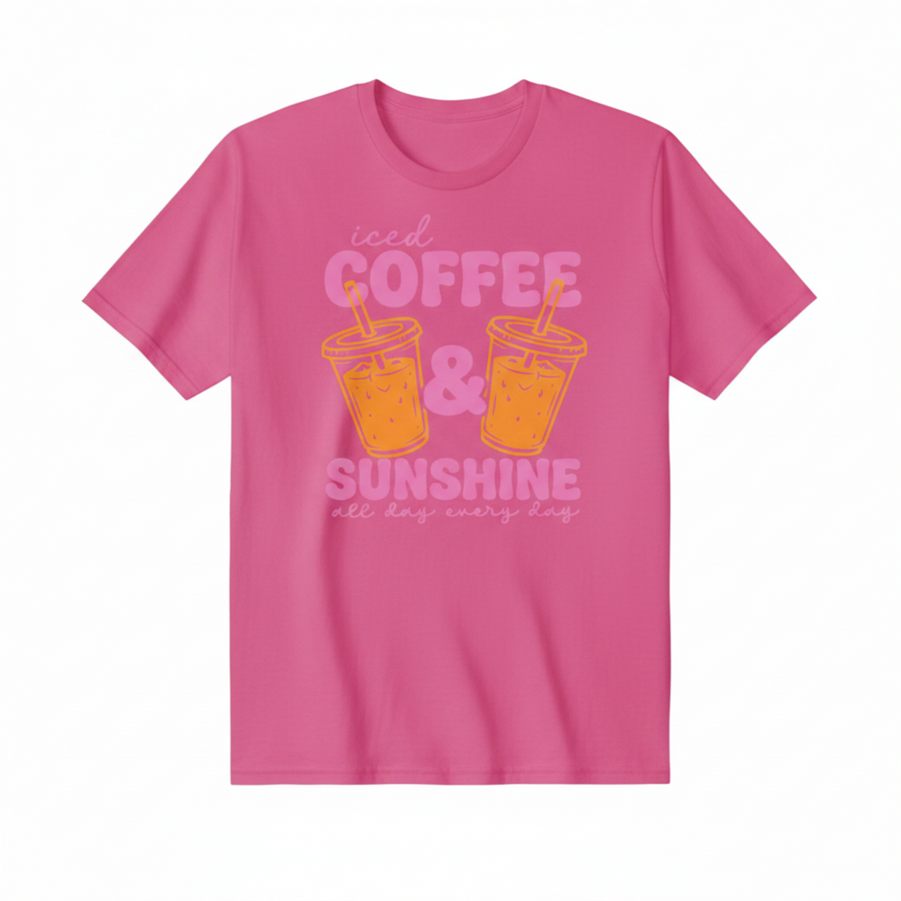 Adorable Coffee Lover Tee featuring bold retro-style pink lettering with two illustrated iced coffee cups, available in hot pink, orange, and white.