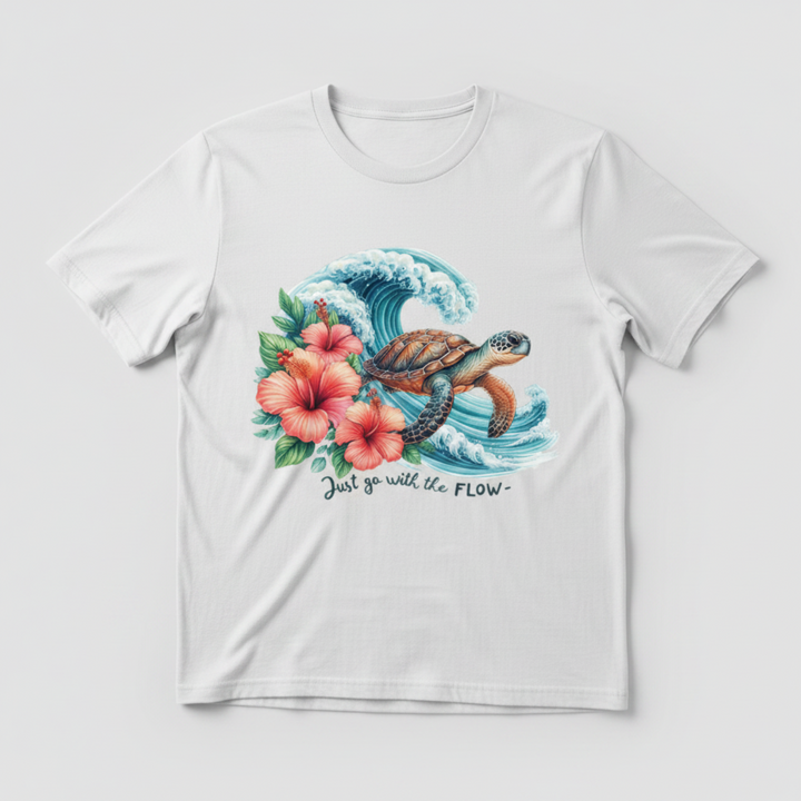 Breathtaking Sea Turtle Graphic Tee featuring a detailed watercolor sea turtle gliding through a dramatic ocean wave with pink hibiscus flowers.