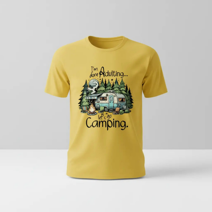 A vibrant Funny Camper Graphic Tee featuring a glowing moon scene and a cozy retro camper trailer illustration